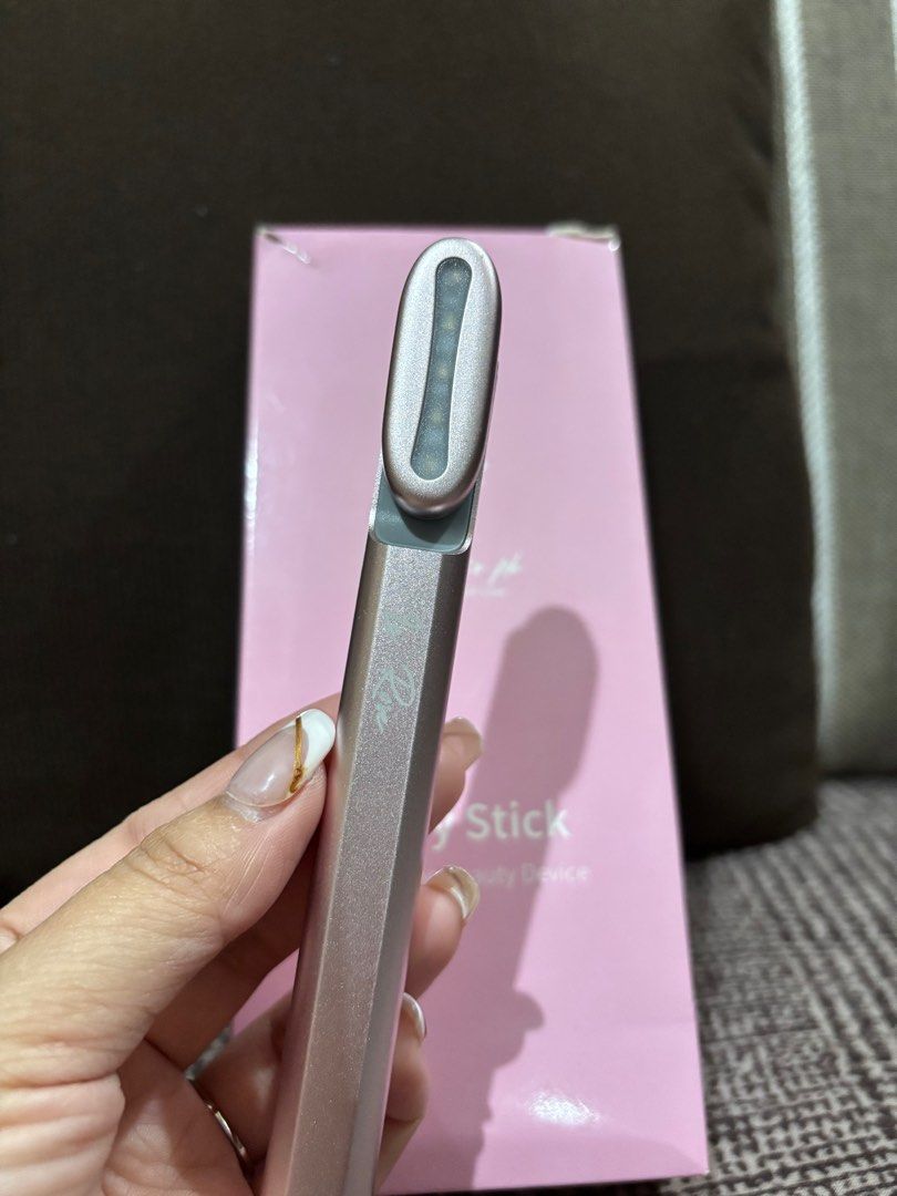 Red light Therapy Beauty Wand (Category: Face Care) located in Manila. Submitted by debbieangeles05 (Listing ID 1342507783, Image 3). Description: Fairy Stick- Beauty Wand -Barely used, received as a gift. -Comes with charger and box. -Used for minimizing pores, dries out pimple, calms and rejuvenates skin. -Device is rechargeable. -Price still negotiable..