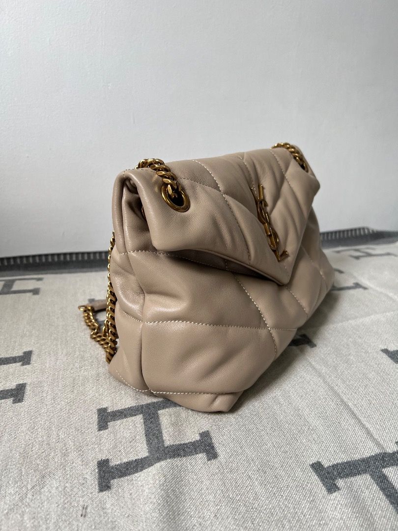 YSL Puffer Small in Leather Shoulder Bag (Category: Luxury Bags & Wallets) located in Antipolo. Submitted by chanchimj (Listing ID 1339141763, Image 2). Description: Gros-grain lining, a zippered inner pocket inside the bag for mobile phones and valuables, no extra inner pocket design, can be light, single shoulder, crossbody, hand-carried, wandering, and many other ways of carrying, use it as you like! Dimensions : 29 x17 x11cm.