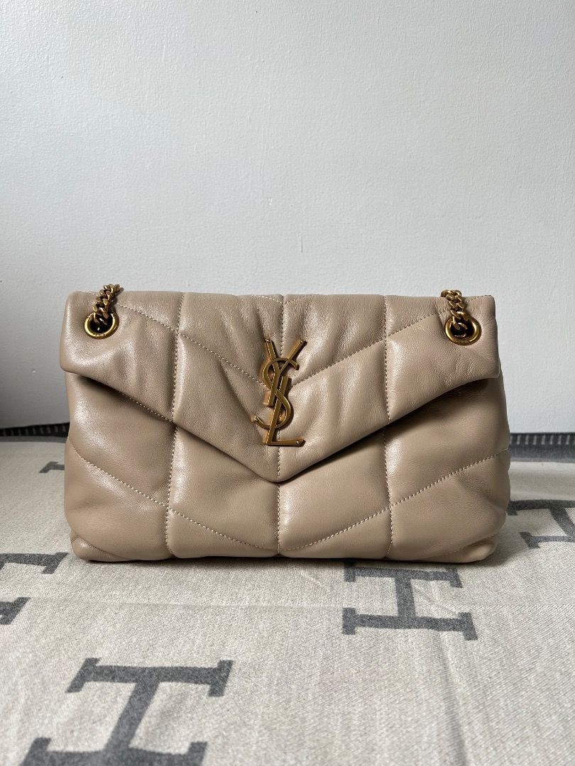 YSL Puffer Small in Leather Shoulder Bag (Category: Luxury Bags & Wallets) located in Antipolo. Submitted by chanchimj (Listing ID 1339141763, Image 1). Description: Gros-grain lining, a zippered inner pocket inside the bag for mobile phones and valuables, no extra inner pocket design, can be light, single shoulder, crossbody, hand-carried, wandering, and many other ways of carrying, use it as you like! Dimensions : 29 x17 x11cm.