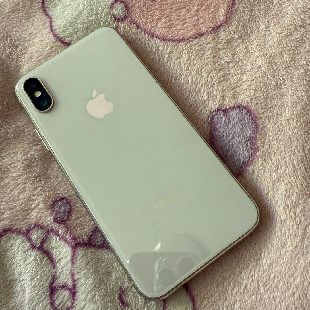 Iphone X 64gb for sale (Category: iPhone X Series) located in Mandaluyong City. Submitted by ukiyokim (Listing ID 1342527727, Image 2). Description: ❌Auto pass for low ballers iPhone X • Lady owned 64gb White 98% smooth ISSUE Battery: Replaced LCD: Replaced No True Tone No Face ID Inclusion: Box only Open for meet up Test all you want Meet up: MRT Boni (Uncle Johns) or SM Marilao Delivery: Same day delivery for nearby or via LBC .