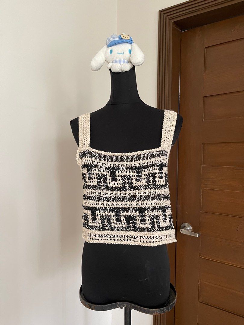 Knit (?) top (Category: Sleeveless) located in Davao. Submitted by declutteredtrinkets (Listing ID 1342559211, Image 1). Description: Cute when worn over a bandeau, but too big on me. fits: medium-large frames MOP: Gcash shipping will be shouldered by the buyer: LBC/J&T/JRS.