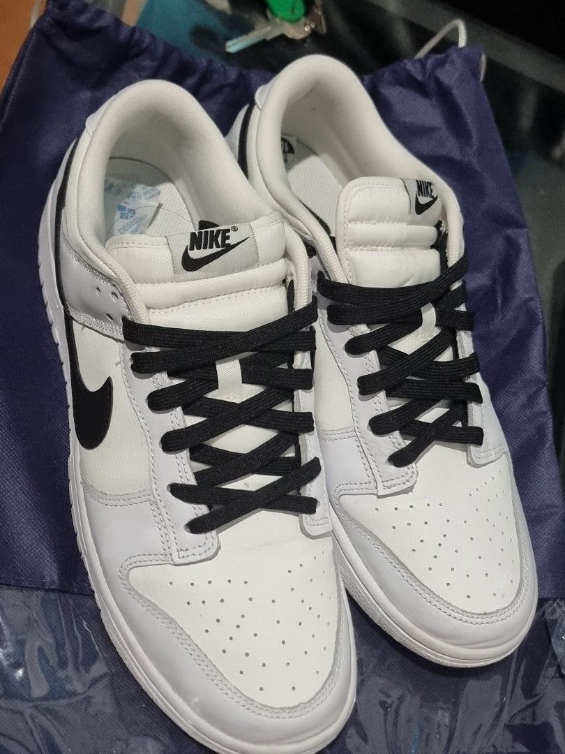 NIKE Dunk low reverse panda (Category: Sneakers) located in Quezon City. Submitted by bargainsbyk8 (Listing ID 1342642861, Image 2). Description: bought in europe, walang box pero u can legit check lmk lang.