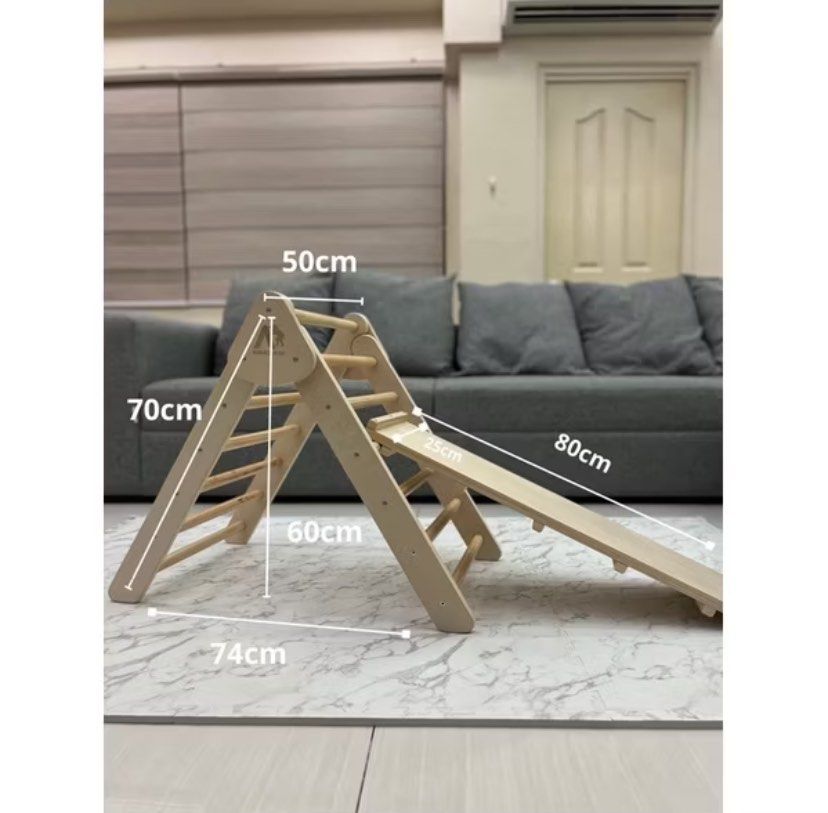 Pikler triangle midi with ramp and lock (Category: Other Kids Furniture) located in Angeles City. Submitted by declutterwithj (Listing ID 1342597269, Image 2). Description: BRAND NEW! Nakafold lang po sa sulok Pikler triangle midi with reversible ramp and lock (new added feature) •Made of birchwood panels & pinewood rungs • Easy fold •Sturdy (can take up to 50kg) •All edges are rounded.
