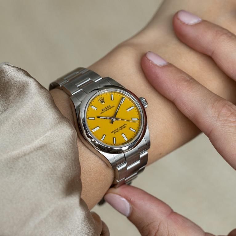 *Rare**Lowest* Rolex OP31 Yellow 277200 (Nov 2020) (Category: Watches) located in Singapore. Submitted by timecapsule.456 (Listing ID 1342657593, Image 2). Description: This piece is really something special. Today we have a mint example of a yellow Oyster Perpetual 31mm. This dial colour has been discontinued across every size, and this was because the yellow lacquered dial was very difficult to finish. As such, Rolex only produced for ~1.5 year