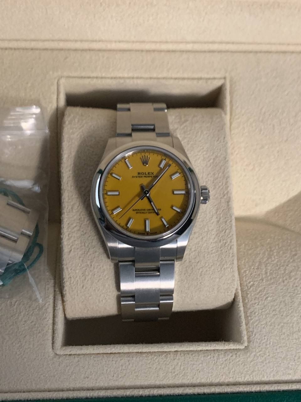*Rare**Lowest* Rolex OP31 Yellow 277200 (Nov 2020) (Category: Watches) located in Singapore. Submitted by timecapsule.456 (Listing ID 1342657593, Image 3). Description: This piece is really something special. Today we have a mint example of a yellow Oyster Perpetual 31mm. This dial colour has been discontinued across every size, and this was because the yellow lacquered dial was very difficult to finish. As such, Rolex only produced for ~1.5 year