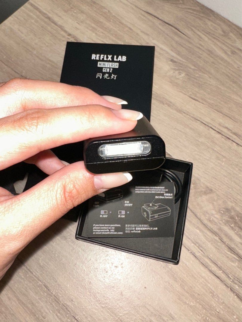 REFLX LAB MINI GEN 2 (Category: Cameras) located in Tarlac. Submitted by ___shopalyssa (Listing ID 1342546807, Image 3). Description: Mini external flash ~ Less than a month old Perfect when travelling bec it’s not bulky, and can play with the camera. Rechargeable Comes with the box, cloth bag, and a Type-C charger. .