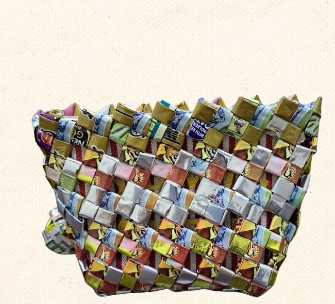 Silverwood (Category: Purses & Pouches) located in Singapore. Submitted by bcaresg (Listing ID 1342540339, Image 2). Description: Pouch with zip made from recycled materials Dimensions: W: 15 cm, H: 11 cm This zip pouch is handcrafted from recycled materials, featuring a colorful woven design and a fun charm. Perfect for carrying small essentials like makeup, coins, or keys. This bag is lovingly made by our dedicated volunteer, Melody. A senior h