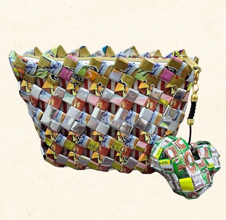 Silverwood (Category: Purses & Pouches) located in Singapore. Submitted by bcaresg (Listing ID 1342540339, Image 1). Description: Pouch with zip made from recycled materials Dimensions: W: 15 cm, H: 11 cm This zip pouch is handcrafted from recycled materials, featuring a colorful woven design and a fun charm. Perfect for carrying small essentials like makeup, coins, or keys. This bag is lovingly made by our dedicated volunteer, Melody. A senior h