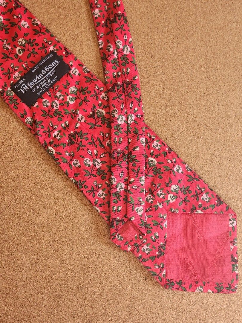 T.M. Lewin Floral Tie (Category: Ties) located in Baguio. Submitted by sartorialpieces_footwear (Listing ID 1342515705, Image 2). Description: T.M. Lewin & Sons Blush Floral Tie Statement piece Made in England Personal Item. Slightly Neg..