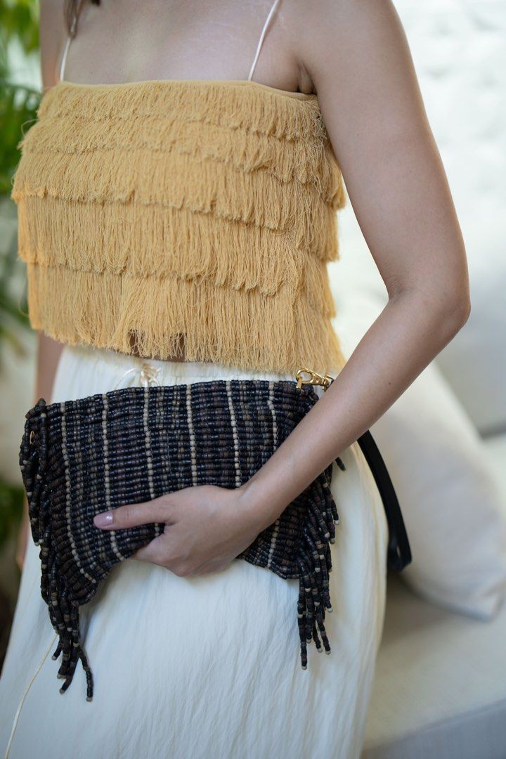 Aranaz Beaded fringe clutch (Category: Clutches) located in Quezon City. Submitted by tan__k (Listing ID 1336361303, Image 2). Description: Like new condition no issues all photos posted are actual photos. Last price posted. No haggling please 😀 Very unique vintage vibe Used once only. comes with dustbag .