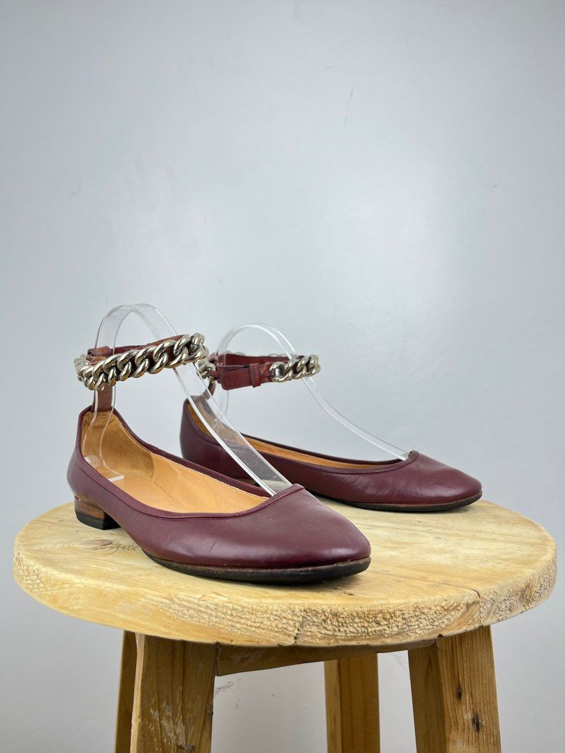 Celine Chain Accent Links Leather Ballet Flats (Category: Sneakers & Footwear) located in Dasmarinas. Submitted by bandananowheree (Listing ID 1339539932, Image 1). Description: Celine Leather Ballet Flats By Phoebe Philo Burgundy Round-Toes with Chain-Link Accents Wrap-Around Straps & Snap Closure at Ankles Sz 35 IT 22cm .