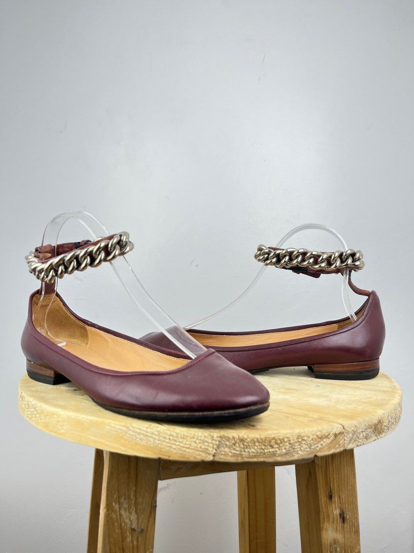 Celine Chain Accent Links Leather Ballet Flats (Category: Sneakers & Footwear) located in Dasmarinas. Submitted by bandananowheree (Listing ID 1339539932, Image 3). Description: Celine Leather Ballet Flats By Phoebe Philo Burgundy Round-Toes with Chain-Link Accents Wrap-Around Straps & Snap Closure at Ankles Sz 35 IT 22cm .
