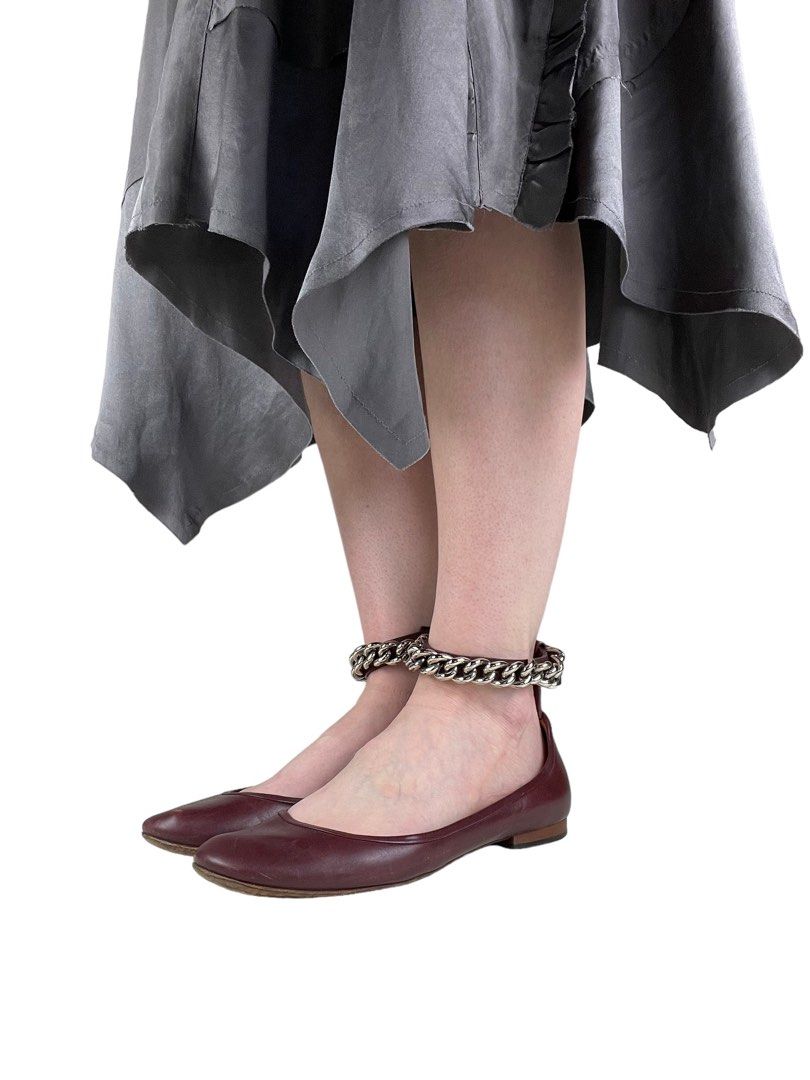 Celine Chain Accent Links Leather Ballet Flats (Category: Sneakers & Footwear) located in Dasmarinas. Submitted by bandananowheree (Listing ID 1339539932, Image 2). Description: Celine Leather Ballet Flats By Phoebe Philo Burgundy Round-Toes with Chain-Link Accents Wrap-Around Straps & Snap Closure at Ankles Sz 35 IT 22cm .