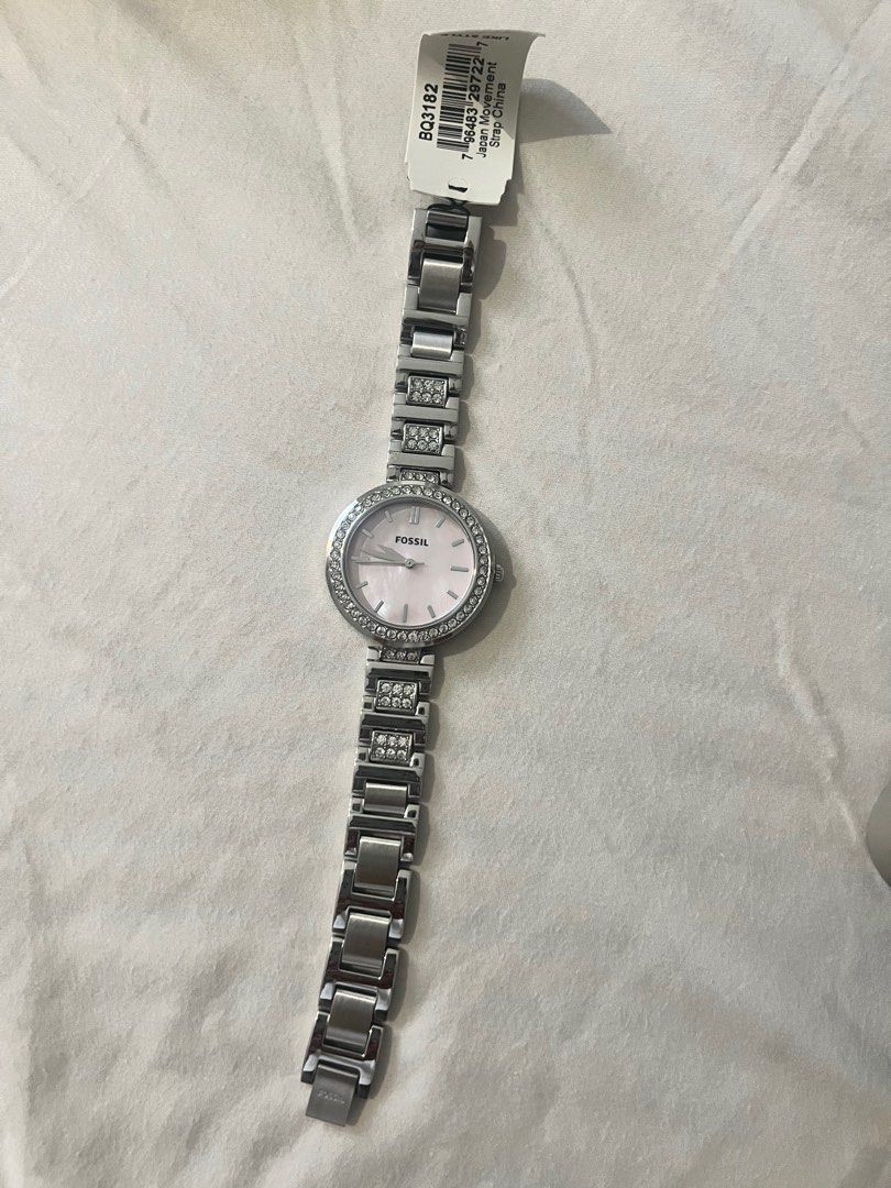 Fossil Karli Three Hand Stainless Steel 34mm (Category: Women's Watches) located in Quezon City. Submitted by triciaodejar (Listing ID 1339374900, Image 3). Description: Brand-new with tag and metal box Sku: BQ3182 Case Size: 34 mm Movement: Quartz Three-Hand Platform: Karli Strap Material: Stainless Steel Strap Colour: Silver Case Water Resistance: 5 ATM Case Material: Stainless Steel Case Colour: Silver Dial Colour: Pink Mother-Of-Pearl Strap F