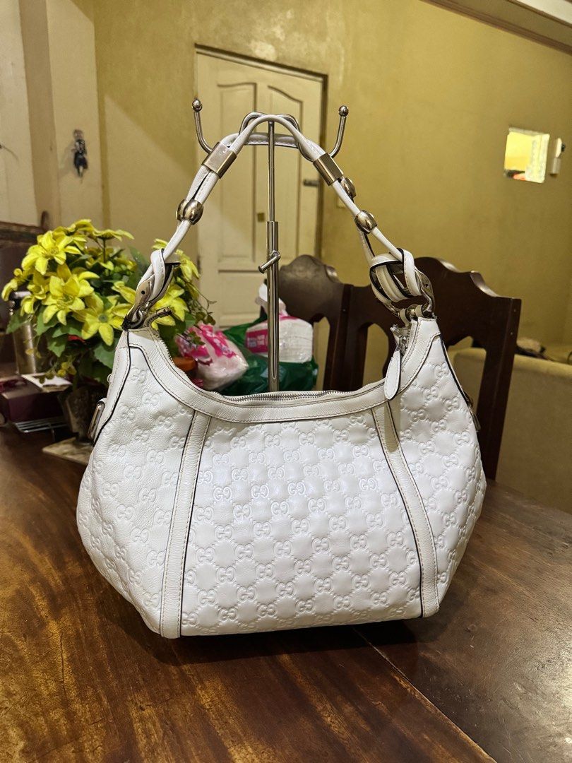 Gucci Guccissima Hobo Bag (Category: Luxury Bags & Wallets) located in Bacolod City. Submitted by novymae23 (Listing ID 1339445608, Image 1). Description: Gucci Guccissima Hobo Bag Size Medium Excellentn Condition Minor Issue Inside Dirt Only .