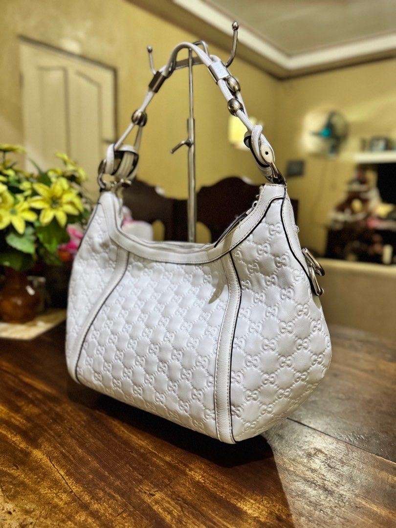 Gucci Guccissima Hobo Bag (Category: Luxury Bags & Wallets) located in Bacolod City. Submitted by novymae23 (Listing ID 1339445608, Image 2). Description: Gucci Guccissima Hobo Bag Size Medium Excellentn Condition Minor Issue Inside Dirt Only .