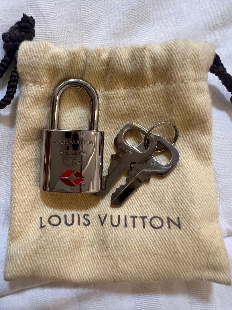 LV padlock with keys (Category: Luxury Bags & Wallets) located in Pasig City. Submitted by plslovemeagain (Listing ID 1339492823, Image 1). Description: .