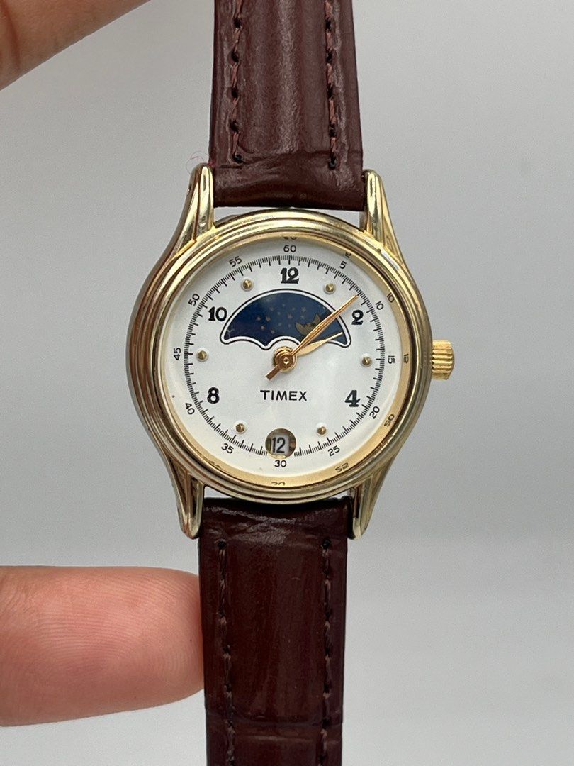 2000s Timex Moonphase White Arabic Dial (Category: Luxury Watches) located in Quezon City. Submitted by thepassageoftime (Listing ID 1342847420, Image 2). Description: IG: @the.passageoftime Quartz movement New aftermarket strap Size: 24Wx29L MOP: Gcash/Bank transfer Delivery: Lalamove/LBC .