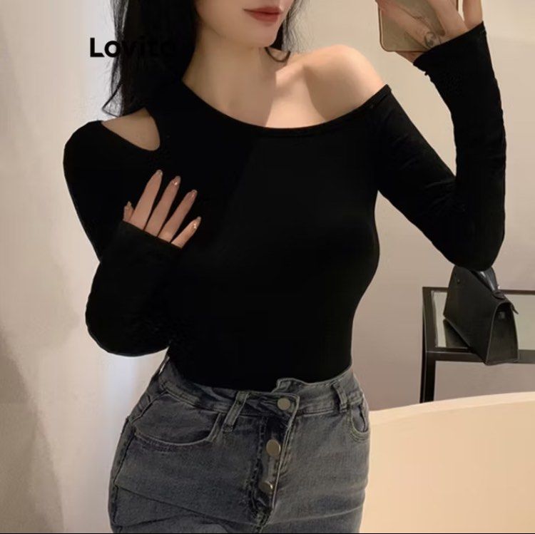 asymmetrical cut out long sleeve top (Category: Longsleeves) located in Bacoor. Submitted by krstnd_ (Listing ID 1342744456, Image 1). Description: brand new ✨ RFS - wrong size bought for/original price - ₱300 size - small (can fit up to m).