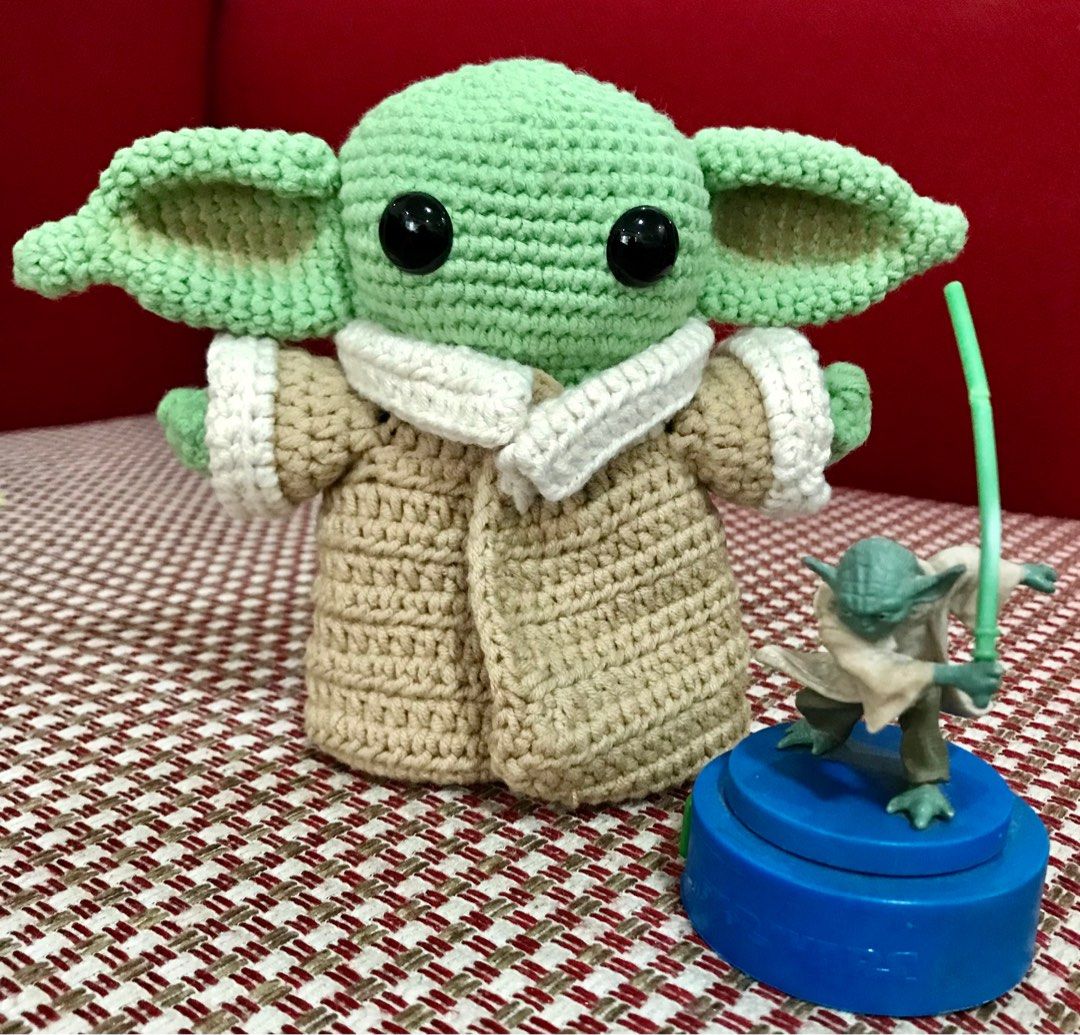 Grogu amigurumi (Category: Plushies & Soft Toys) located in Paranaque City. Submitted by runnerako (Listing ID 1342693933, Image 1). Description: Hand-made amigurumi. Measures 5-inch tall. With detachable robe. .