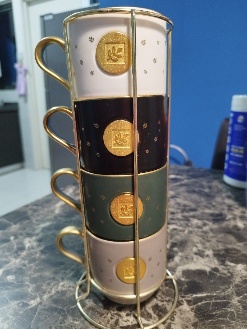 Nutrilite Stackable Mug Set (Category: Coffee & Tea Tableware) located in Petaling Jaya. Submitted by SmileSmileSmiles (Listing ID 1342807773, Image 3). Description: Nutrilite Stackable Mug Set with premium gold plated comes with four beautiful different colours cups You will like it. Worth the price. I only have one set.