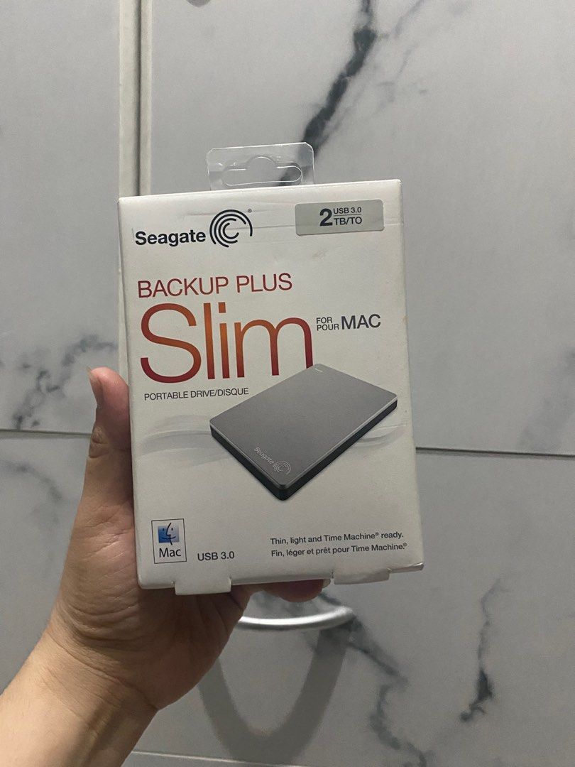 Seagate Backup Plus Slim Portable Drive for Mac (Category: Hard Disks & Thumbdrives) located in Makati City. Submitted by havshop (Listing ID 1342839875, Image 1). Description: Product Identifiers Compatible - Mac Brand - Seagate MPN - STDS2000100 Ean - 0763649061411, 0763649052938 GTIN - 0763649061411, 0763649052938 UPC - 0763649061411, 0763649052938 22026514682 Storage Capacity - 2TB Color - Silver Cache- 32MB Form Factor - 2.5 in Cloud Storage