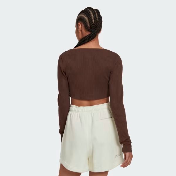 Adidas Studio Lounge Ribbed Cropped Long Sleeve Tee (Category: Longsleeves) located in Mandaluyong City. Submitted by sha.ra (Listing ID 1342979898, Image 2). Description: Adidas Studio Lounge Ribbed Cropped Long Sleeve Tee Used only once Bought for P1,500 Size XS, but fits S removed the tag on the side.