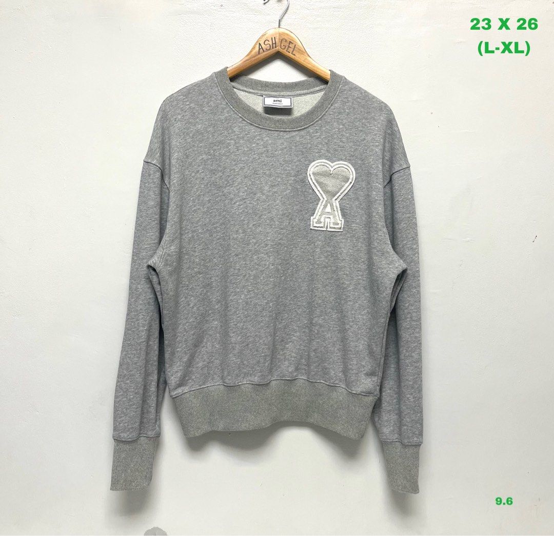 Ami Paris Sweatshirt (Category: Luxury Apparel) located in Tarlac. Submitted by ashgelprelovedqualityclothes (Listing ID 1342988763, Image 1). Description: EUC 9.6 OR BETTER SEE PHOTO FOR MORE DETAILS 23 X 26 (L-XL) .