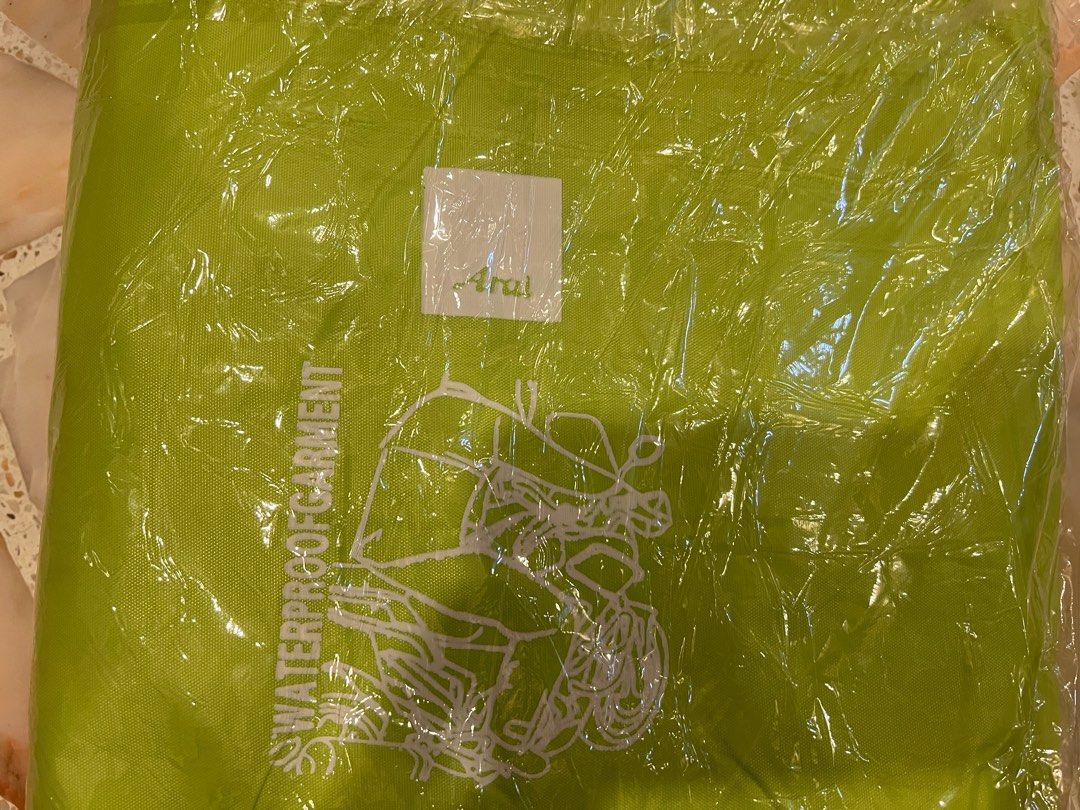 Arai Raincoat - L (Category: Coats, Jackets and Outerwear) located in Singapore. Submitted by mohamed_z (Listing ID 1342997205, Image 3). Description: Arai Raincoat retail at $50. Got it as a gift. Condition new but plastic torn at the corner. Brand new. ONLY JACKET (no rain pants).