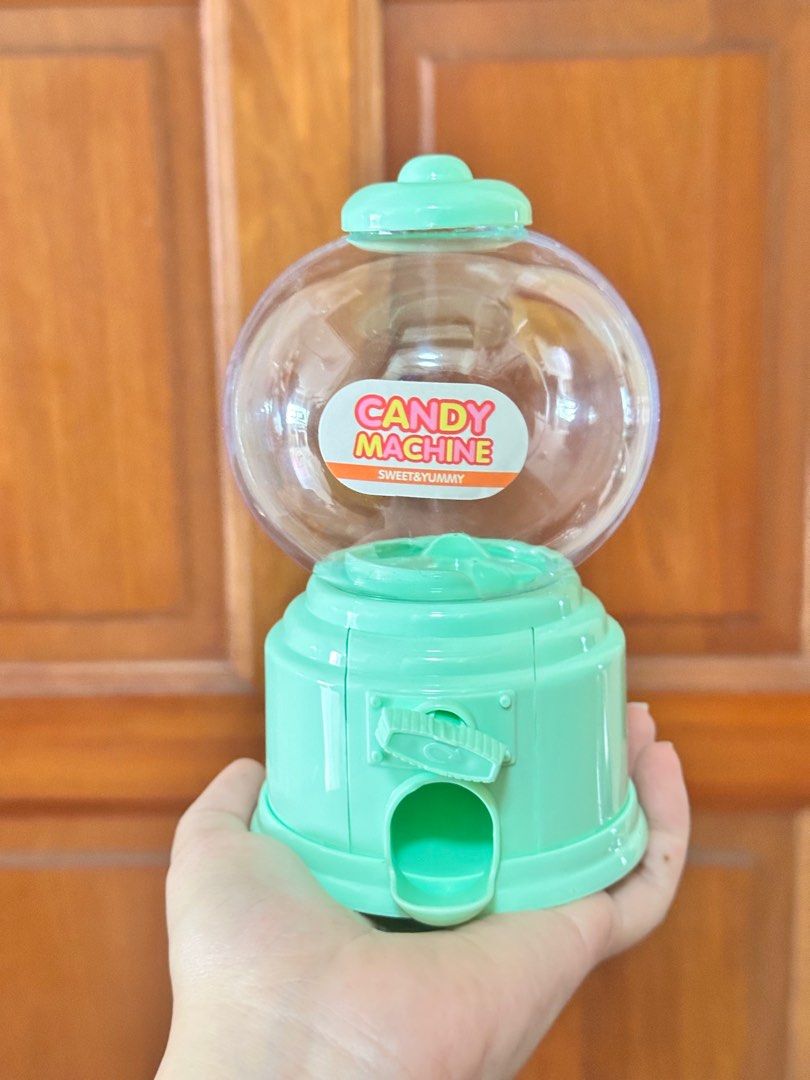Candy Machine (Category: Kids Toys) located in Singapore. Submitted by peanutbutterjelly88 (Listing ID 1342955304, Image 2). Description: each $7 Size 9cm Width X 9cm Length X 14cm Height.