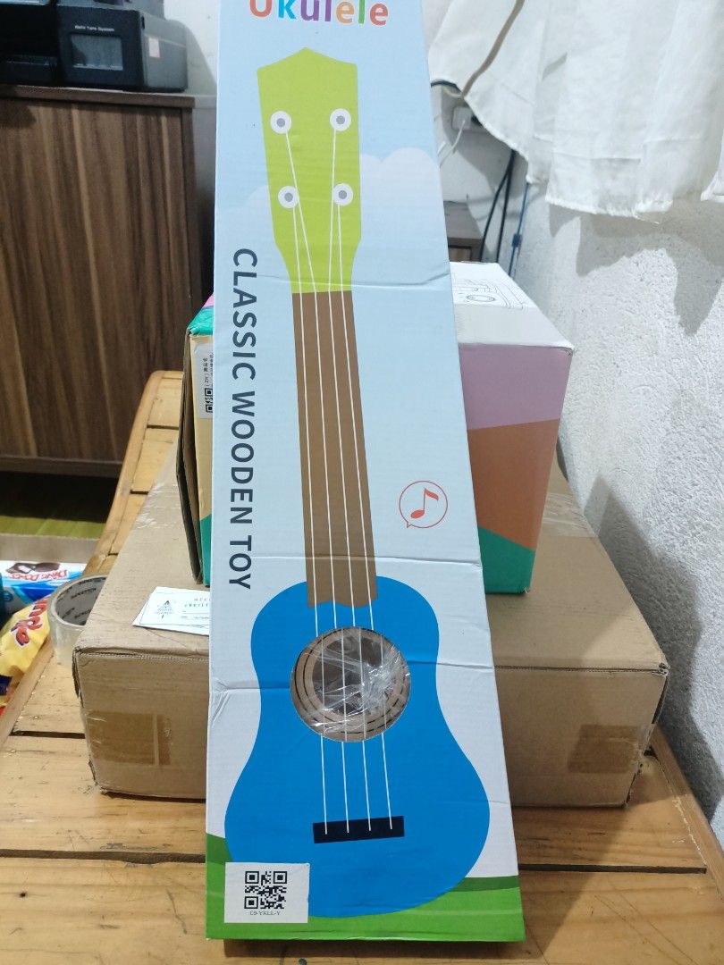 Ukelele - Classic Wooden Toy (Category: Musical Instruments) located in Manila. Submitted by rejcards0725 (Listing ID 1342886194, Image 2). Description: Bought at Php487 Selling at Php 400 only Brand new. Never been used..