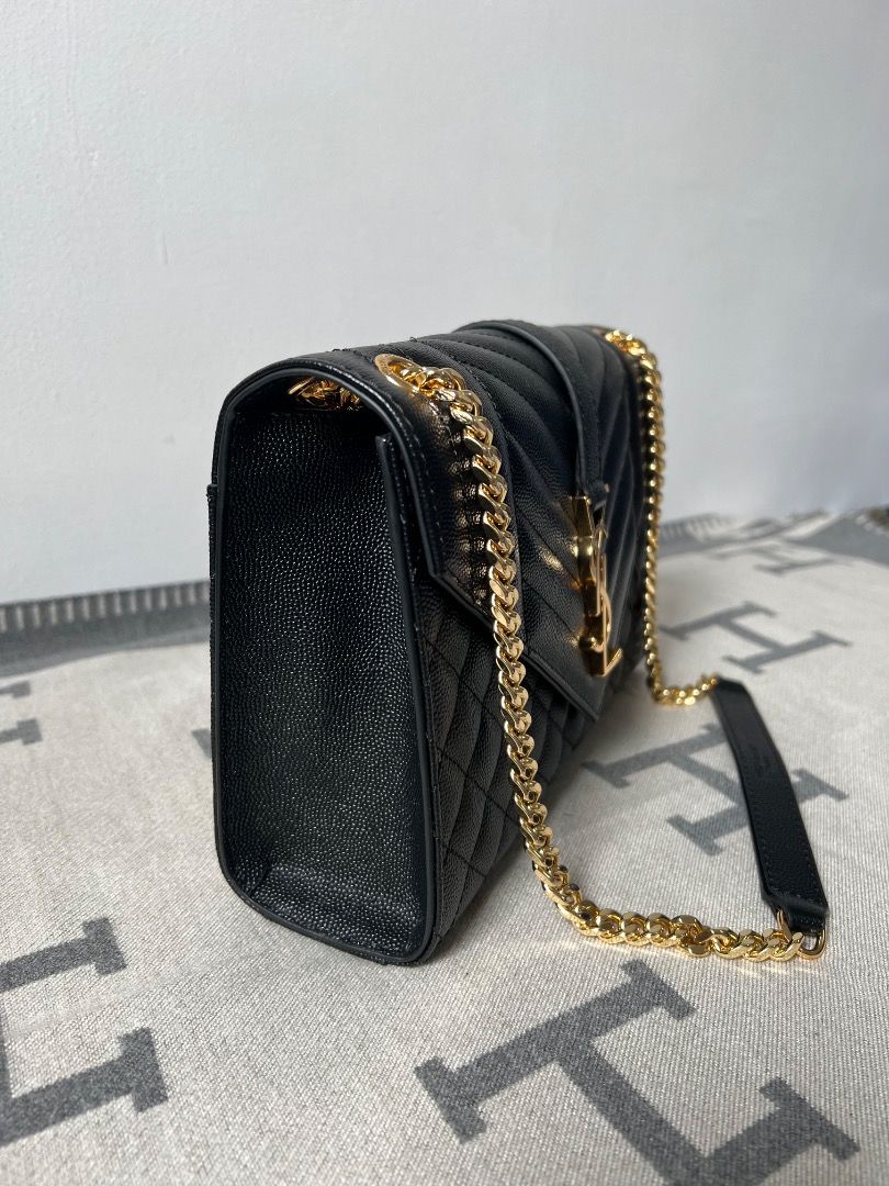 YSL Envelope Medium Quilted Grain Embossed Chain Bag (Category: Luxury Bags & Wallets) located in Antipolo. Submitted by chanchimj (Listing ID 1327355244, Image 2). Description: TIMELESS ENVELOPE FLAP BAG IN GRAIN DE POUDRE EMBOSSED LEATHER, FEATURING CHEVRON AND DIAMOND QUILT OVERSTITCHING. VERSATILE BAG WITH AN ADJUSTABLE SLIDING CHAIN. DIMENSIONS: 9.4 X 6.9 X 2.3 INCHES.