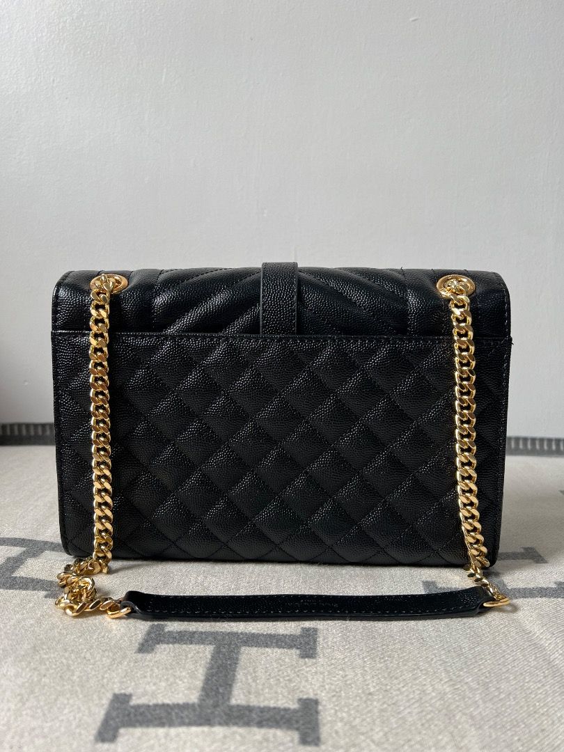 YSL Envelope Medium Quilted Grain Embossed Chain Bag (Category: Luxury Bags & Wallets) located in Antipolo. Submitted by chanchimj (Listing ID 1327355244, Image 3). Description: TIMELESS ENVELOPE FLAP BAG IN GRAIN DE POUDRE EMBOSSED LEATHER, FEATURING CHEVRON AND DIAMOND QUILT OVERSTITCHING. VERSATILE BAG WITH AN ADJUSTABLE SLIDING CHAIN. DIMENSIONS: 9.4 X 6.9 X 2.3 INCHES.