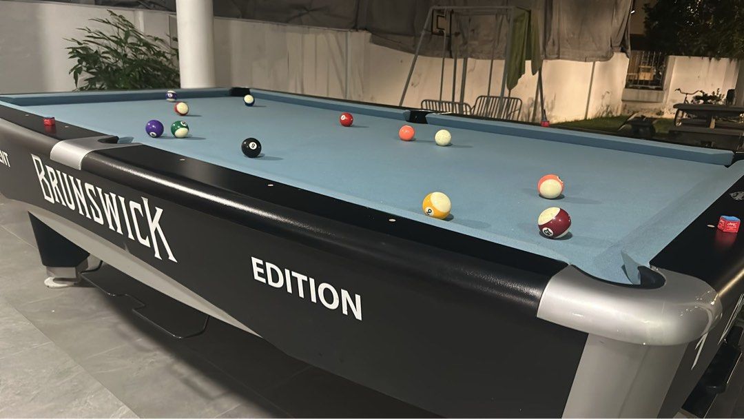 9ft Pool Table (Category: Billiards & Bowling) located in Singapore. Submitted by pinnacle-solution (Listing ID 1343095478, Image 2). Description: 9ft Metro Brunswick Pool Table Free ground level installation New cloth Playing accessories .