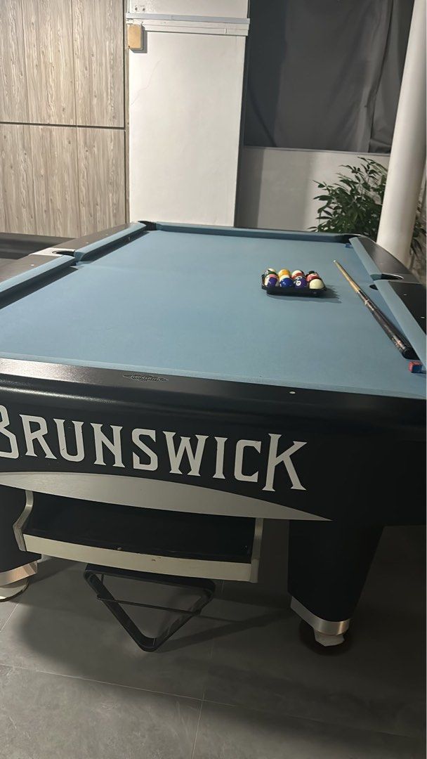 9ft Pool Table (Category: Billiards & Bowling) located in Singapore. Submitted by pinnacle-solution (Listing ID 1343095478, Image 3). Description: 9ft Metro Brunswick Pool Table Free ground level installation New cloth Playing accessories .