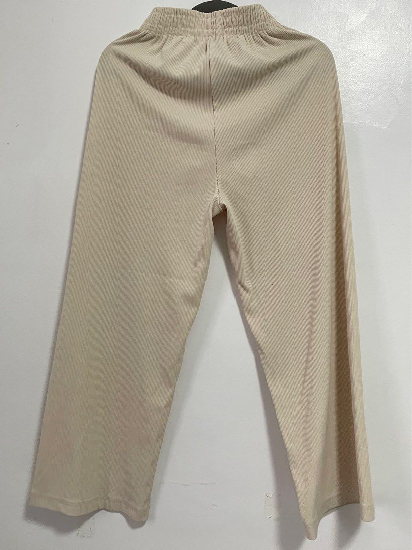 cream knitted wide pants (Category: Other Bottoms) located in Tacloban City. Submitted by declutterpatter (Listing ID 1343063665, Image 1). Description: w - 24-30 l -35.