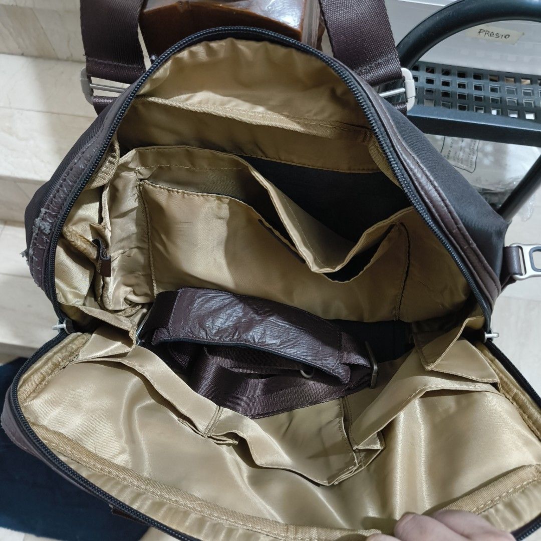 Europak Messenger Bag (Category: Laptop Bags & Sleeves) located in Paranaque City. Submitted by 365inasnap (Listing ID 1343161895, Image 2). Description: My dad is in the process of disposing bags he does not use. This is his Europak (Bang) Bag he uses for work. This does not come with pads in case you are in the market for a laptop bag. Comes with multiple pockets and a detachable strap. Photo when worn is included; dad is 5'8". Please note that