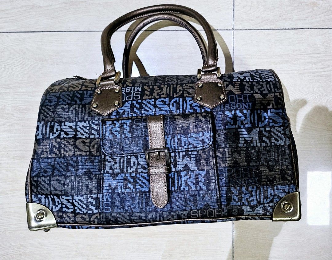 missoni coated canvas doctors bag (Category: Luxury Bags & Wallets) located in Makati City. Submitted by shopdoc (Listing ID 1343099419, Image 1). Description: Missoni Monogrammed Logo pvc doctors bag. Purchased in Korea and guaranteed authentic. In very good condition with no signs of usage. Handle bronze brown in color. rfs decluttering.