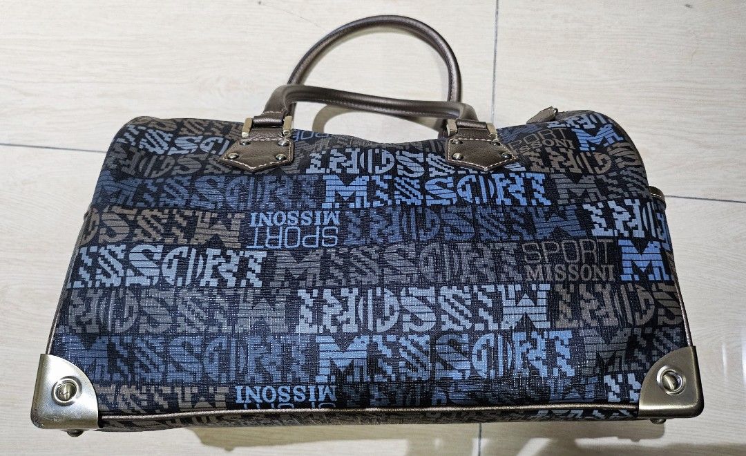 missoni coated canvas doctors bag (Category: Luxury Bags & Wallets) located in Makati City. Submitted by shopdoc (Listing ID 1343099419, Image 3). Description: Missoni Monogrammed Logo pvc doctors bag. Purchased in Korea and guaranteed authentic. In very good condition with no signs of usage. Handle bronze brown in color. rfs decluttering.