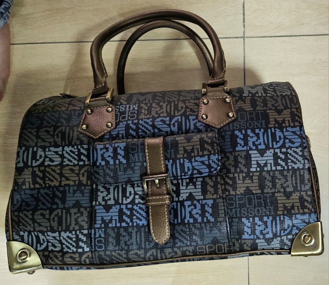 missoni coated canvas doctors bag (Category: Luxury Bags & Wallets) located in Makati City. Submitted by shopdoc (Listing ID 1343099419, Image 2). Description: Missoni Monogrammed Logo pvc doctors bag. Purchased in Korea and guaranteed authentic. In very good condition with no signs of usage. Handle bronze brown in color. rfs decluttering.