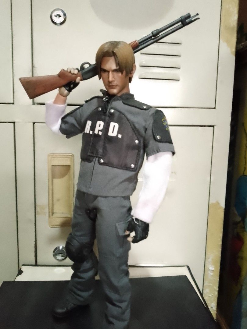 Resident evil 12inch Leon (Category: Figurines & Statues) located in Taguig. Submitted by titus40k (Listing ID 1343154227, Image 2). Description: Hottoys resident evil 4 leon kennedy uniform RPD, other accesories are customs, good condition 1/6 or 12inch, articulated figure.pick up thru grab..