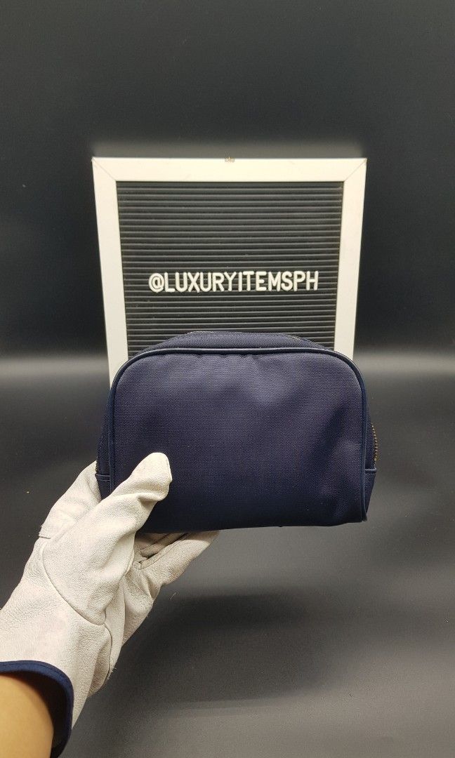 Valentino Garavani pouch (Category: Luxury Bags & Wallets) located in Pamplona. Submitted by luxuryitems_ph (Listing ID 1343041219, Image 2). Description: In good condition(clean interior/some bubbles) no inclusion..