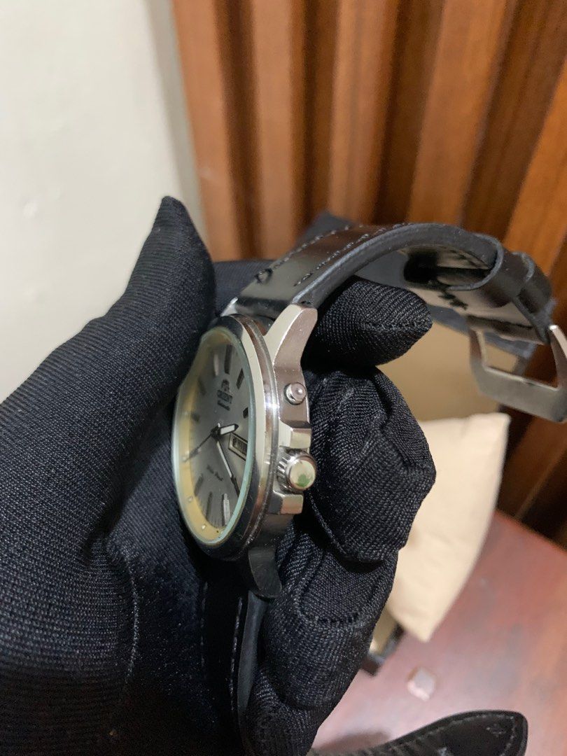 Vintage Orient Watch - Automatic Day-Date - White Dial (Category: Men's Watches) located in Dasmarinas. Submitted by phamhannii (Listing ID 1343097250, Image 3). Description: Vintage Orient Automatic Watch EM7J-C4-A 41mm Day-Date White Dial Leather Strap (Aftermarket) Excellent Running Condition Water Resist Comes w/ free replacement box Dial Condition: 8.5/10 (yellowing and minimal chip on the edges) Overall Condition: 9.2/10 Great Condition Neg