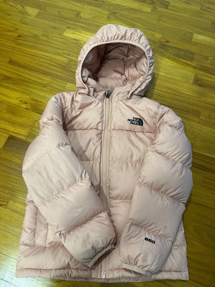Winter Jacket (Category: Babies & Kids Fashion) located in Singapore. Submitted by egglazy (Listing ID 1343052230, Image 1). Description: The North Face winter down jacket. Size S. Baby pink color. Shell is 100% polyester, filling for body, sleeves and hood is 75% down feathers, 25% waterfowl feathers. Power 550. Suitable for sub zero to less than 15 degrees. Retail price $350. Worn once. Can be machine wash in a cloth bag and to be air dried onl