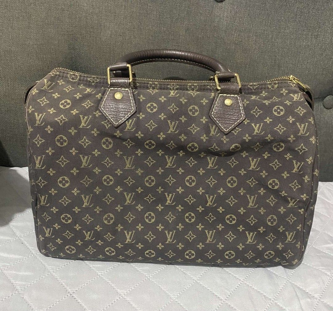 Authentic LV Speedy 30 Mini lin (Category: Luxury Bags & Wallets) located in Bacoor. Submitted by dangcalanc18223 (Listing ID 1343379734, Image 2). Description: Personal preloved no major issue no rubs in canvas some dirt inside pero natatangal need bag spa if very maselan no foul smell datecode mejo fade na but 100% original very maganda pa free bag organizer courier:lalamove,grab,j&t,lbc.