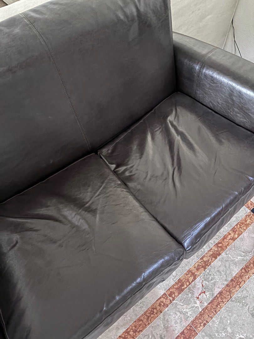 Black Sofa (Category: Sofas) located in Singapore. Submitted by shoppppwithme (Listing ID 1343217813, Image 2). Description: Black Sofa With Minor defect at the right bottom (pls see picture), can be easily patched back 140x80x84cm QYOP, will be clearing in 2 days. Pls arrange your own transportation..