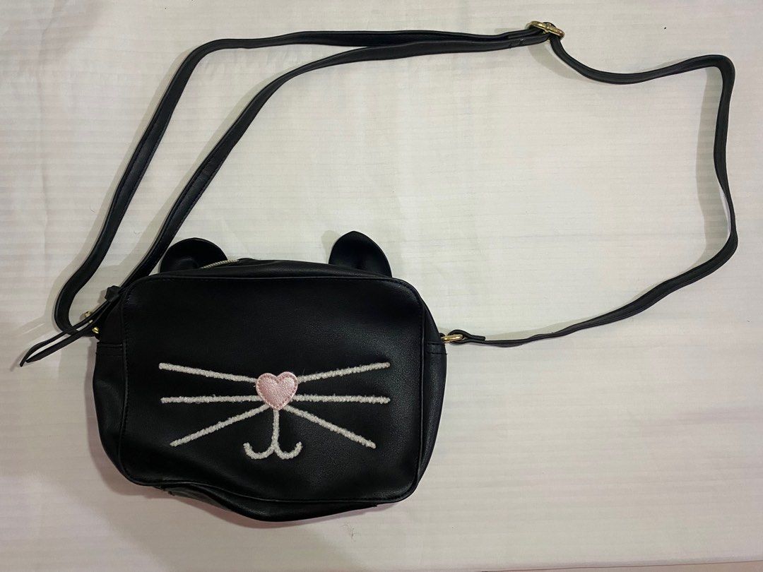 Cat Sling Bag (Category: Purses & Pouches) located in Makati City. Submitted by rewear_ (Listing ID 1343297322, Image 2). Description: .