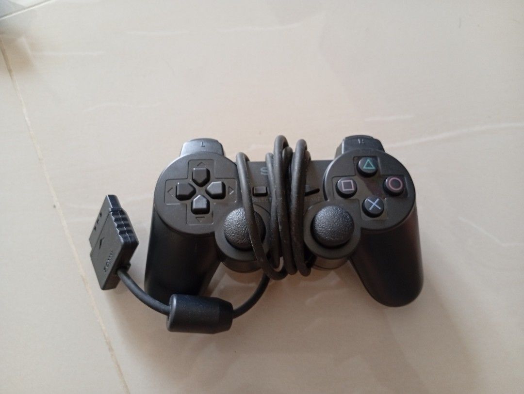 CONTROLLER PS2 (Category: Controllers) located in Kuala Lumpur. Submitted by aaqif60418904 (Listing ID 1343269693, Image 1). Description: ORIGINAL CONTROLLER PS2.
