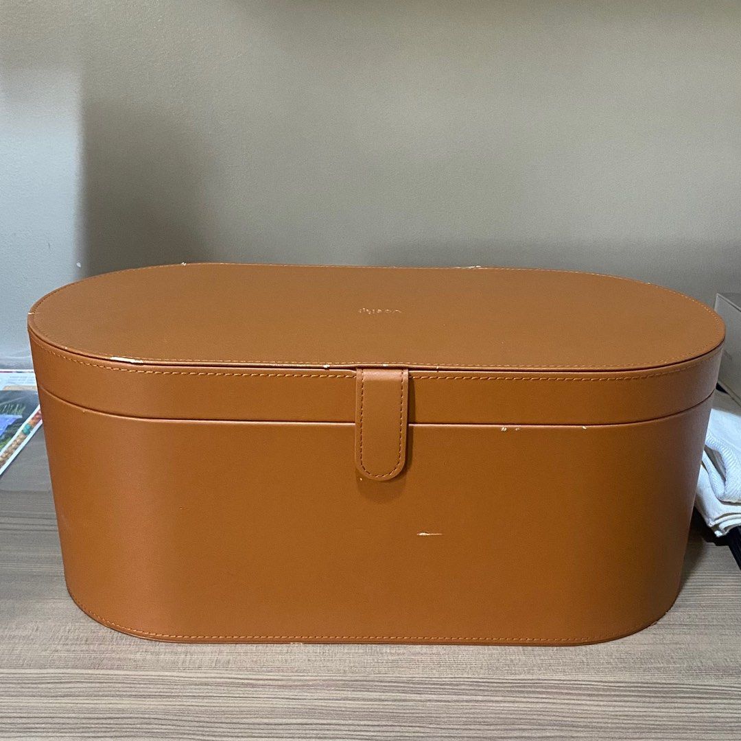 Dyson Airwrap - Hair Curler (Category: Hair) located in Quezon City. Submitted by celRis (Listing ID 1343336896, Image 3). Description: - Barely used - Container has slight damages in the leather - 220-240V - Open to meetups for sure buyers. But can only do meetups in SM North, Trinoma, or Vertis.