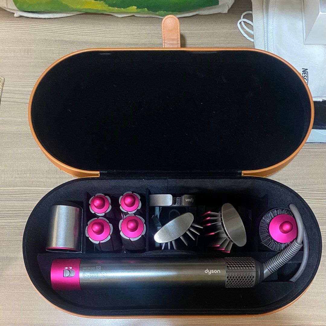 Dyson Airwrap - Hair Curler (Category: Hair) located in Quezon City. Submitted by celRis (Listing ID 1343336896, Image 1). Description: - Barely used - Container has slight damages in the leather - 220-240V - Open to meetups for sure buyers. But can only do meetups in SM North, Trinoma, or Vertis.